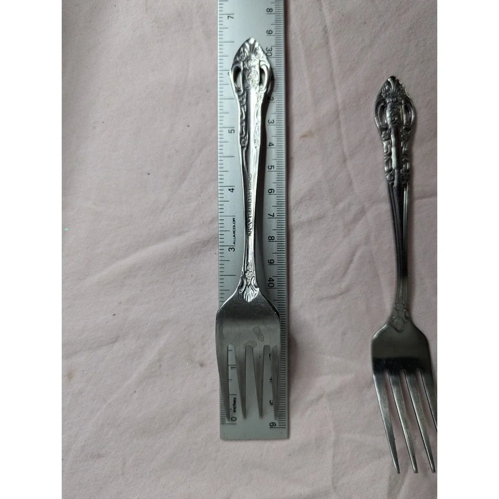 7 lot H.F. LTD Stainless stamped flower pattern 7